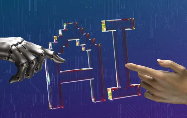 Mani robotiche e mani umane si protendono l'una verso l'altra, simbolo del lavoro umano dietro l'intelligenza artificiale