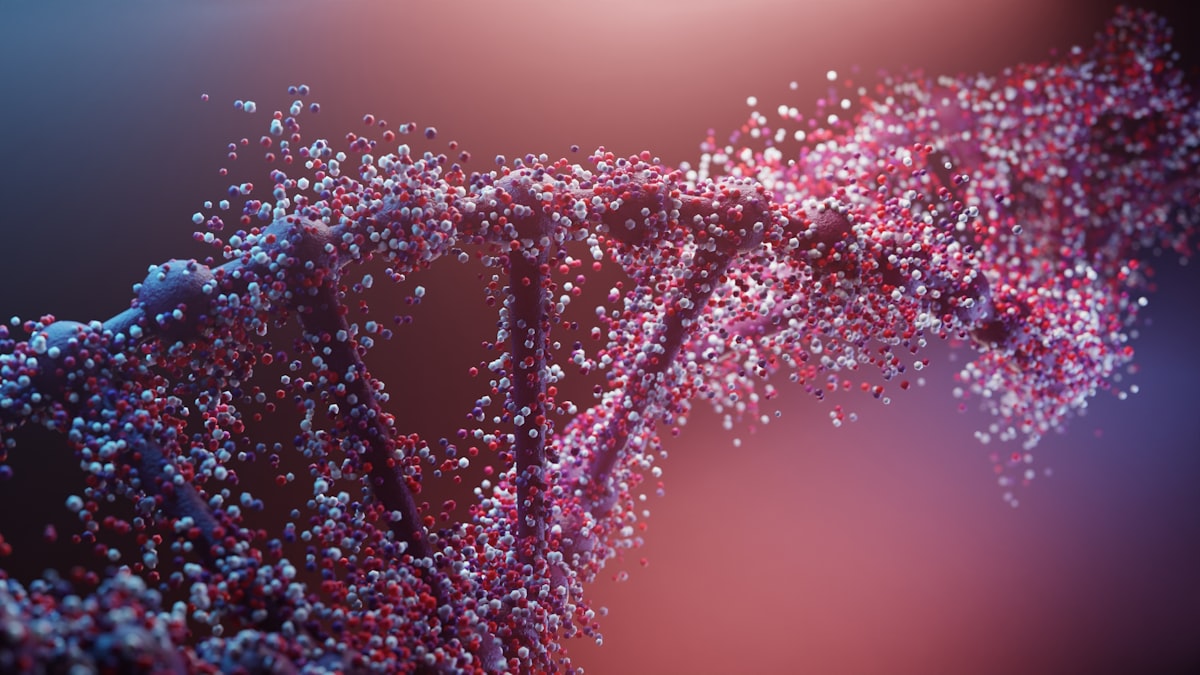 Rappresentazione della doppia elica del DNA composta da particelle luminose, a simboleggiare la mappatura AI del genoma di AlphaGenome Atlas