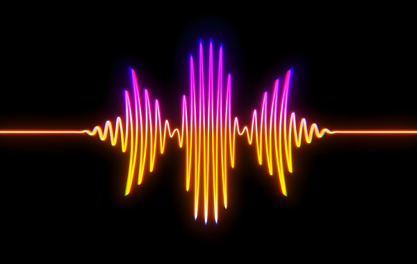 Onda sonora colorata su sfondo scuro che rappresenta la trascrizione vocale con intelligenza artificiale