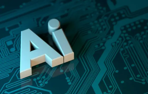 Lettere AI su una scheda elettronica, a rappresentare la pubblicità basata su agenti AI dentro ChatGPT di OpenAI