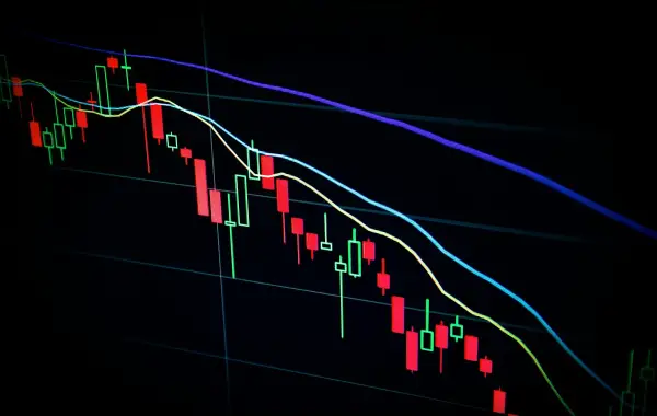 Grafici di borsa su uno schermo, simbolo dell'aumento di capitale di Meta