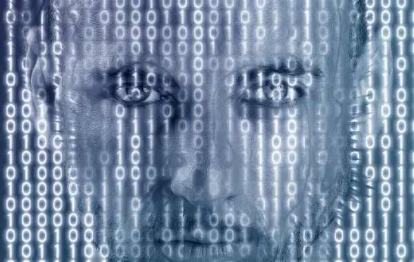 Codice verde in stile matrix su sfondo scuro, simbolo di exploit e sicurezza informatica